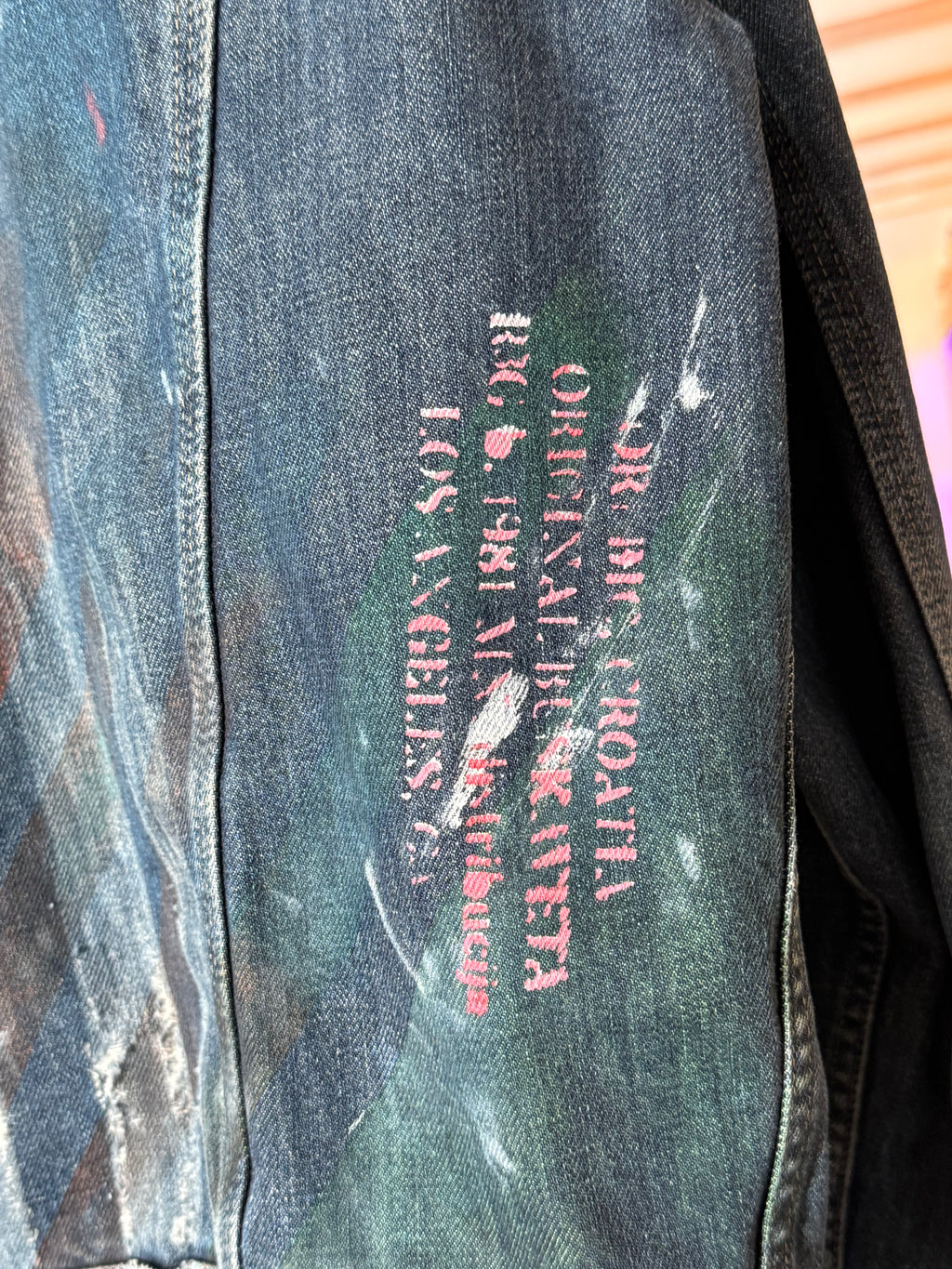 DISTRESSED STRIPED BLUE DENIM TRUCKER JACKET (1/1)