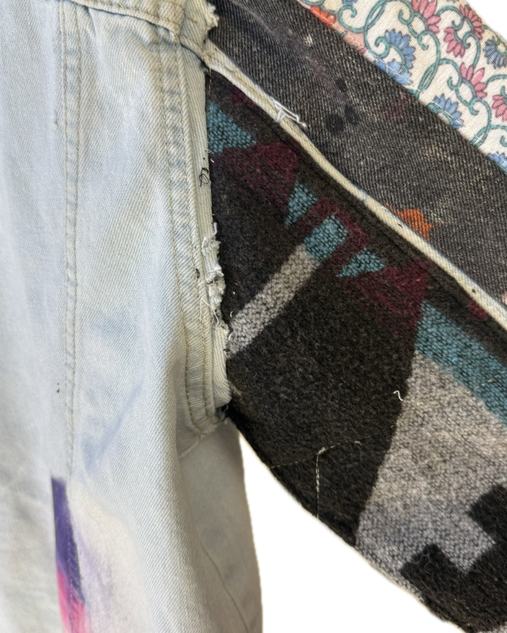 LIGHT BLUE ACID WASH PATCHWORK ARM TRUCKER JACKET (1/1)