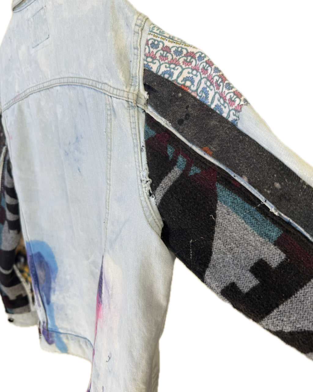 LIGHT BLUE ACID WASH PATCHWORK ARM TRUCKER JACKET (1/1)